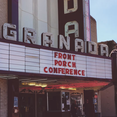 Marquee of Granada Theater reads Front Porch Conference.